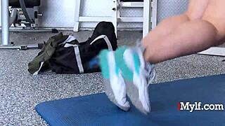 Jessie Rogers gags deep on Donnie Rock's cock at the gym