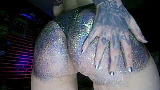 oiled big ass babe gets a shiny massage with colorful glitter sparkles