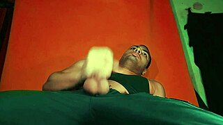 Bodybuilder Jerks Monster 18cm Cock on Guitar in Carrot Backdrop