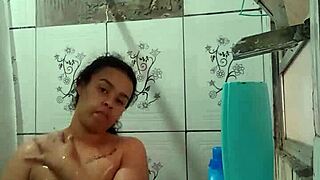 Latina Brunette Shows Off Wet Pussy in Steamy Bath