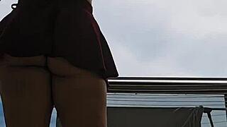 Empregadinha flashes big ass from balcony like a rebel