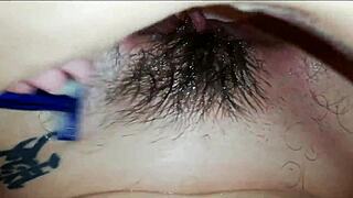 Shaving extreme hairy big clit cunt up close