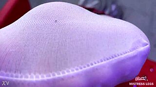 goddess shakes big booty feet tease in white stockings on red sofa