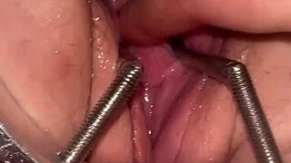 FIST QUEEN PUSSY GAPED BY METAL RING STRETCH