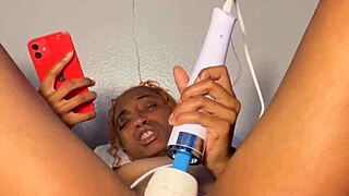 Ebony beauty stuffs panties in wet pussy for late-night orgasm