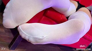 goddess shakes big booty feet tease in white stockings on red sofa