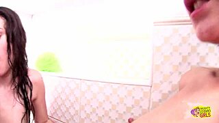 hey these lesbian bimbos are dildo fucking in the bathroom lol