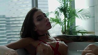 Busty Russian Megan Teases Tits in Bathtub Dance