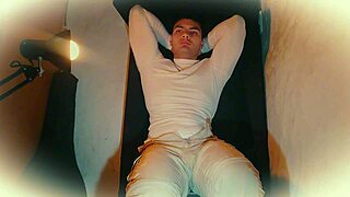 Muscular stud jerks massive cock shiny white!