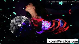 romi... uh, plays with disco ball first then stuffs toys deep in her brunette pussy at the club