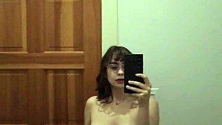 Horny college teen rips clothes for hot solo striptease close-up