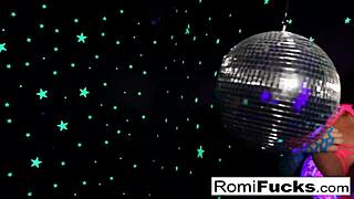 romi... uh, plays with disco ball first then stuffs toys deep in her brunette pussy at the club