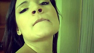 cute brunette in heels toys her natural tits on sofa