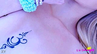 a cute blonde goes naked for close-up photoshoot