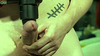 athletic stud's huge cock battles massage gun workout