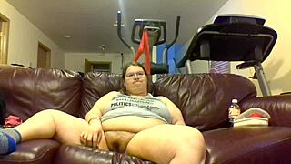 chubby girl pisses while watching tv