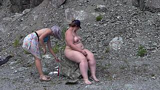 A lesbian with juicy pawg body washes her friend's fat pussy outdoors then licks to clitoral orgasm
