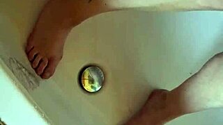 Washing dirty mature german feet in tub teases you