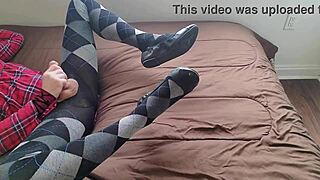 plaid-dressed shemale jerks off in argyle tights slowly