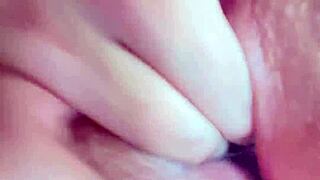 Close-up fingers penetrate wet vagina deeply