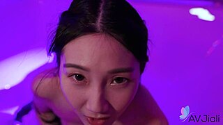 chinese brunette li er moans riding cock in bathroom with shaved pussy.