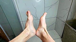 Milf Gives Footjob on Cock in Morning Shower POV