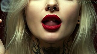 She puffs devilish smokes in her lipstick fetish monster tease