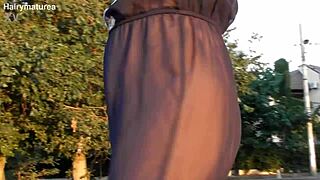 hairy mature flashes see-through outfit outdoors publicly