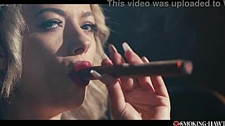 that horny milf strokes her huge tits while blowing and puffing her cigar deep