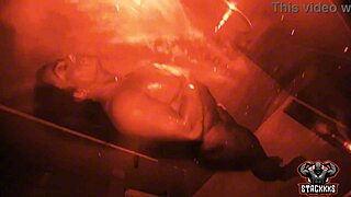 stacxxxs drops ruby muscle the ripped bodybuilder babe in red light district shower soaking her huge natural tits with a black stud