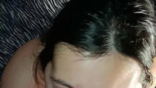 Cute Asian couple's close-up facial after bedtime cock sucking