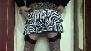 Bisexual Crossdresser Mark Teases in Heels and Stockings