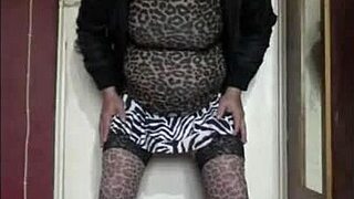 Bisexual Crossdresser Mark Teases in Heels and Stockings