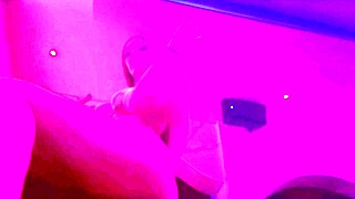 Artemisia Love sits at nightclub in bikini with long hair and big tits