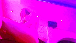 Artemisia Love sits at nightclub in bikini with long hair and big tits