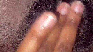 ebony babe's juicy pussy drips wet in bedroom solo foot tease