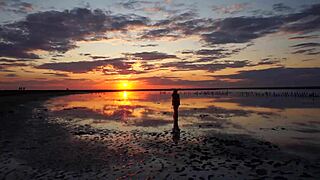 Strolling Elton Salt Lake at Red Sunset