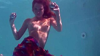 redhead babe nikita vodorezova gets naked fast underwater