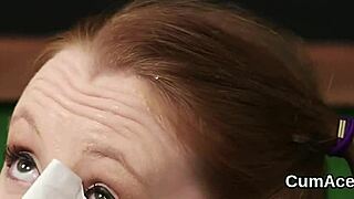 Nasty looker gets cumshot on her face eating all the cream