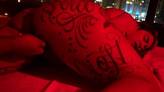 redhead and muscular partner explore waxplay in an interracial setting
