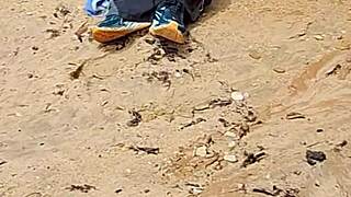 stranger films amateur video of couple on the beach