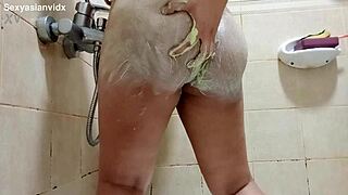 scrubbing my butt in the bathroom