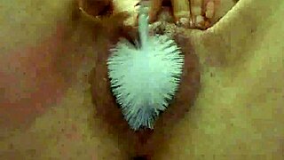 Scrubbed clean with mature pussy and bottle play in private
