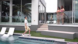 Violet myers and raissa bellini chat by the pool