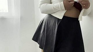 milf strokes her wet shaved pussy while talking dirty on webcam