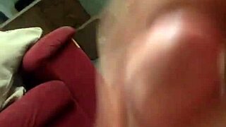 Handjob leads to explosive orgasm in bed