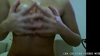 Oily camgirl casually shows off her perfect body and big tits