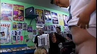 Why is the hot blonde licking her pussy and giving blowjobs to a group of men?