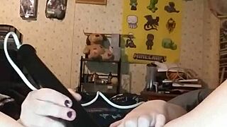 Bella Angirose slips into lingerie for solo toy masturbation.