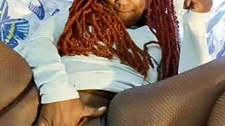 Ebony milf spreads legs for toy masturbation